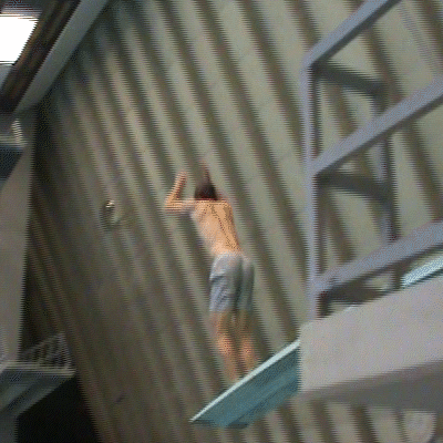 Oscar Lechner belly-flopping off a high dive